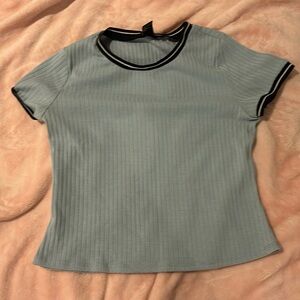 Blue top with dsrk blue detailing